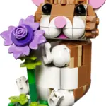 Niedlicher Hamster mit Blume